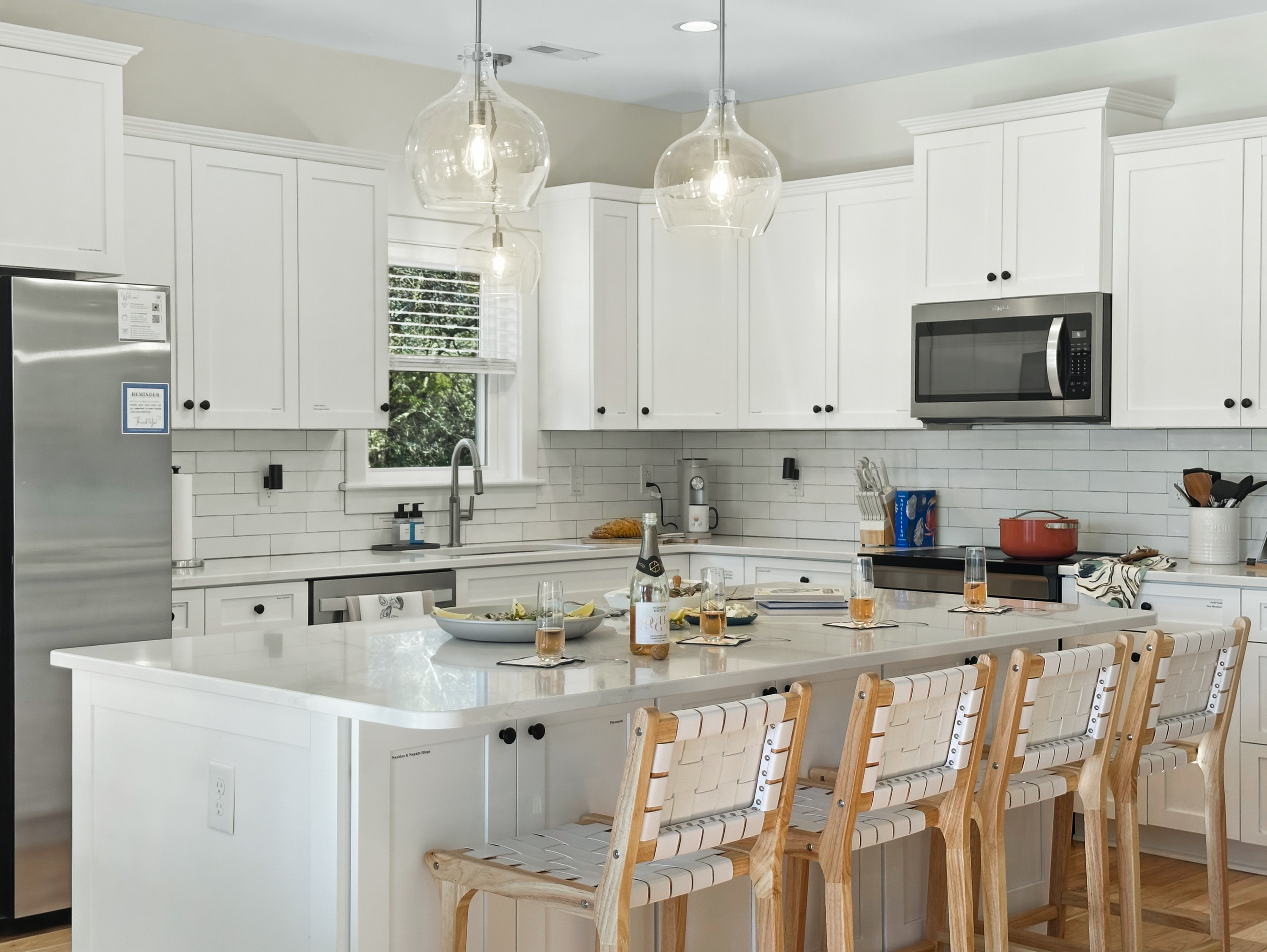 The kitchen comes fully stocked with an induction cooktop.