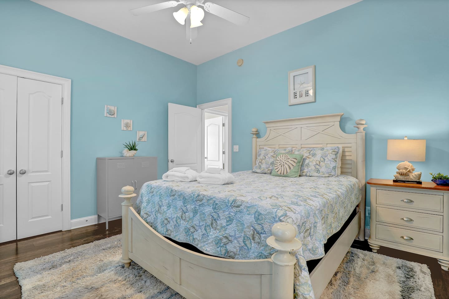 This bedroom is located on the middle level and has an ensuite bathroom.