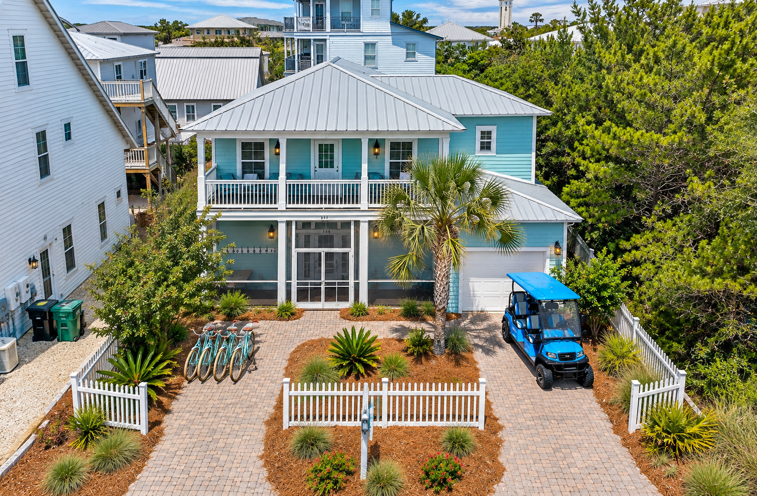 Beautiful coastal home with a spacious driveway, four complimentary bicycles, and a six seat golf cart, offering guests easy access to explore the area in style.
