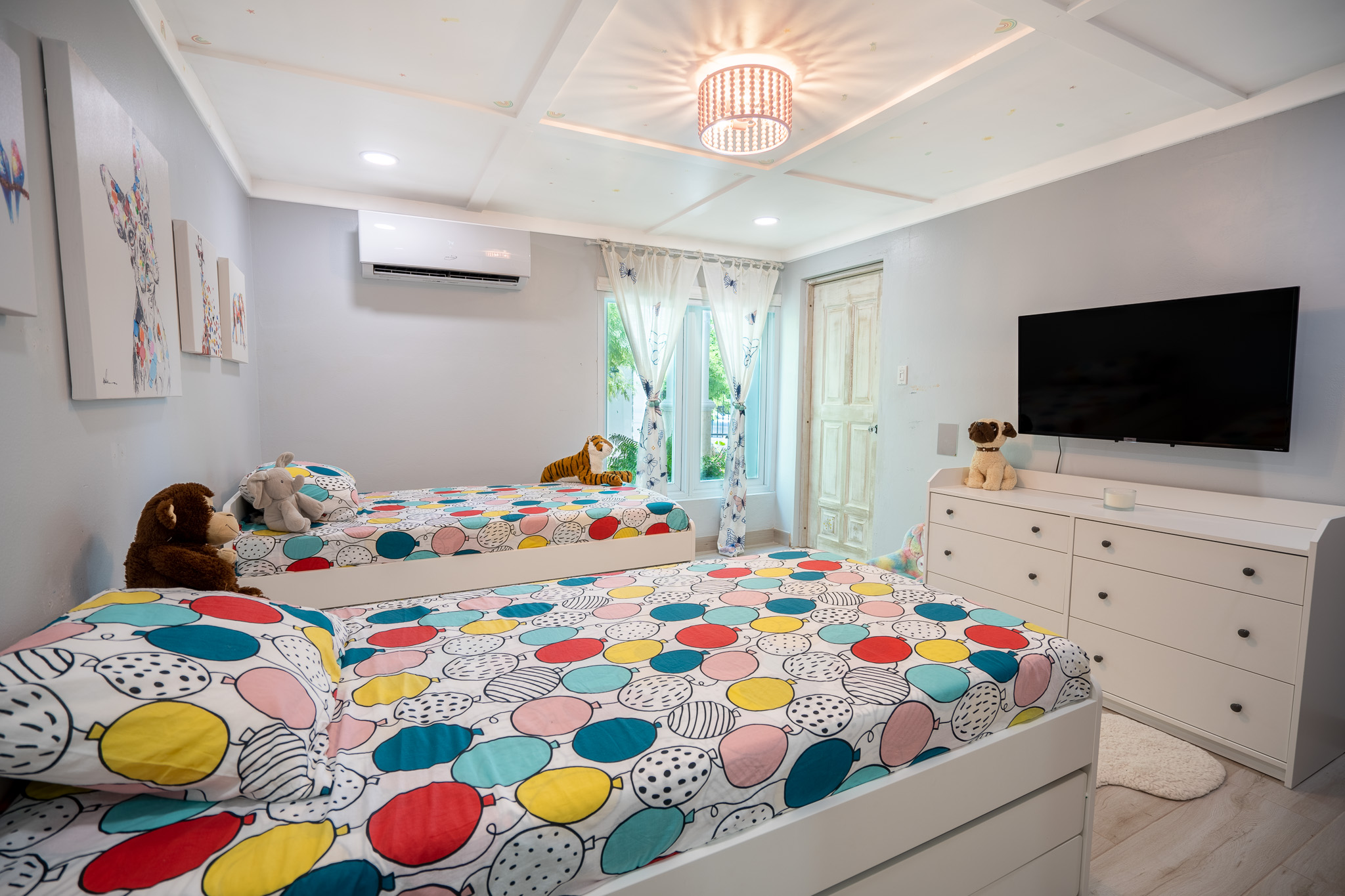 The Childrens Room, filled with color, 4 twin beds, and memories galore