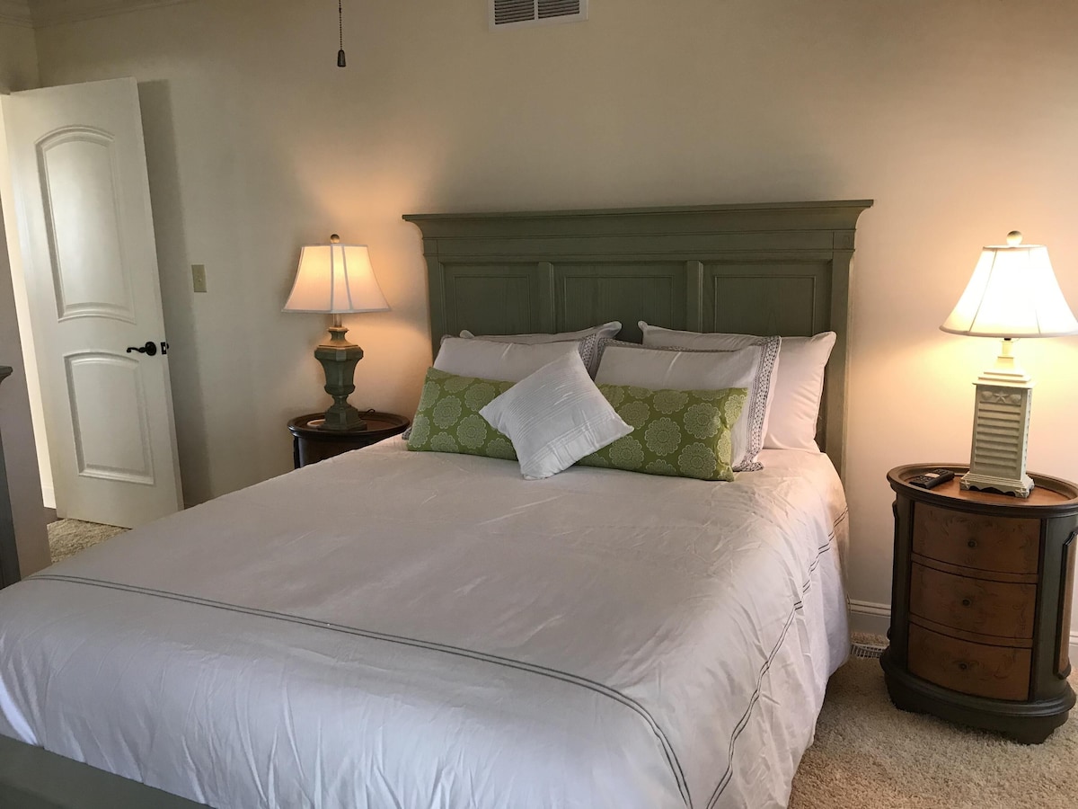 Jr. Master w/ Queen bed, attached full bath, TV, balcony