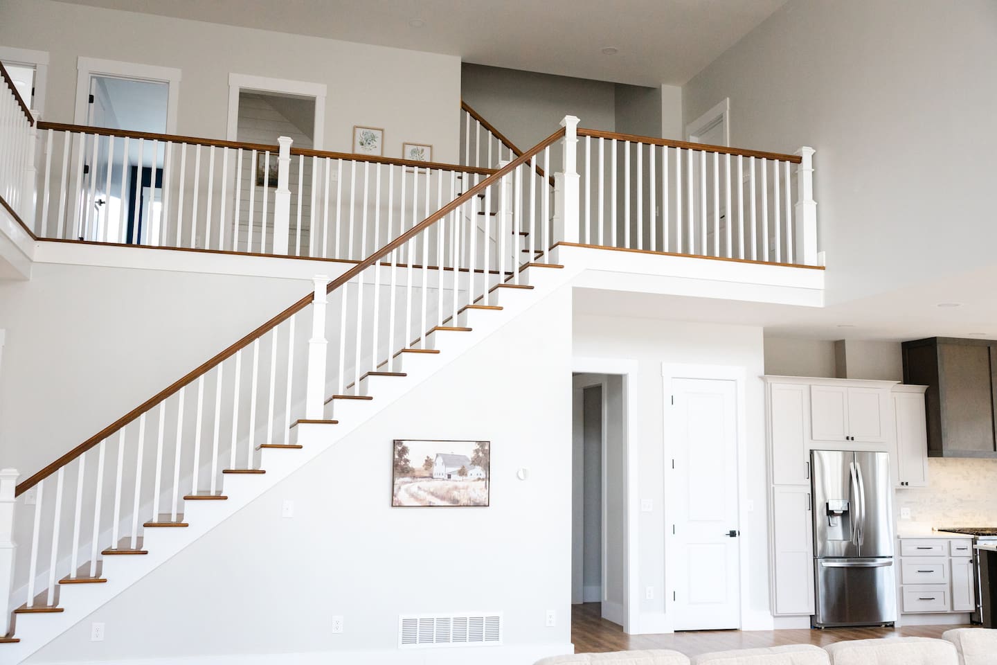 The master bedroom is off the hallway under the steps. The other four bedrooms are off the 2nd floor balcony. The 3rd floor has a movie room, ping pong table, additional workspace, beds, and couches. Plus game systems, board games, and toys.