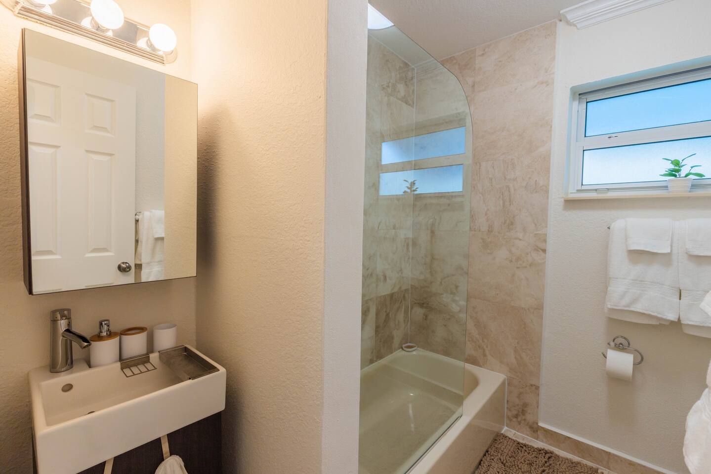 2nd Bathroom is shared between bedrooms 2 and 3. It has a shower & bath combination.