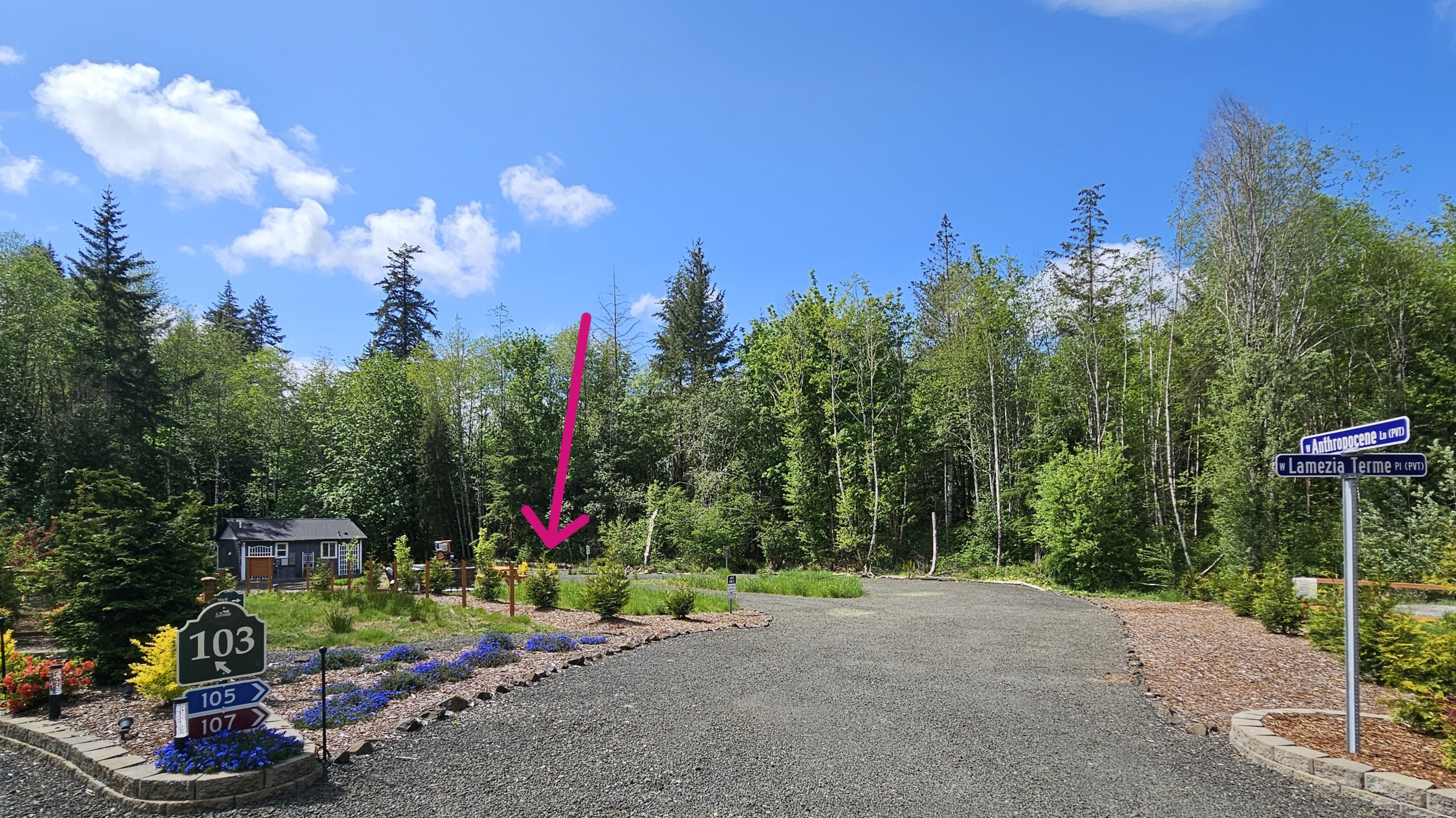 The first driveway curve is over 18' wide at its narrowest.  From here, the RV site can be accessed as pull-in/back-out.