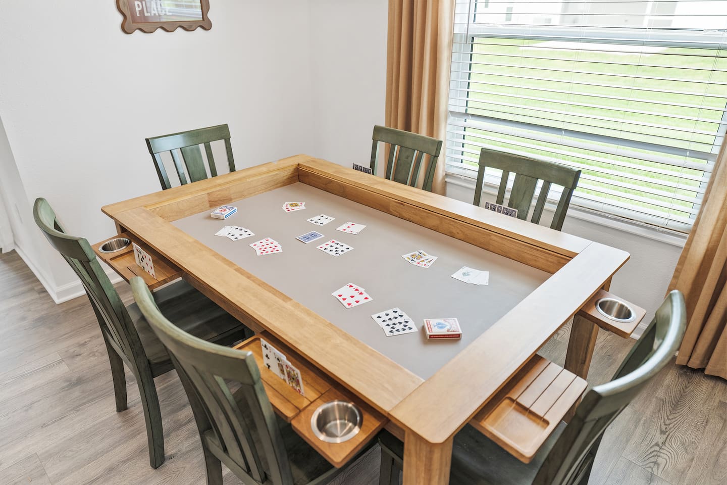 This dining game table features 6 cup holders and card holding slots to make game night a blast!