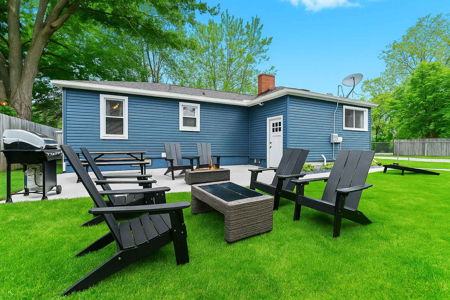 Gather around the gas fire table or fire up the BBQ—this fenced backyard is perfect for relaxing, grilling, and making memories.