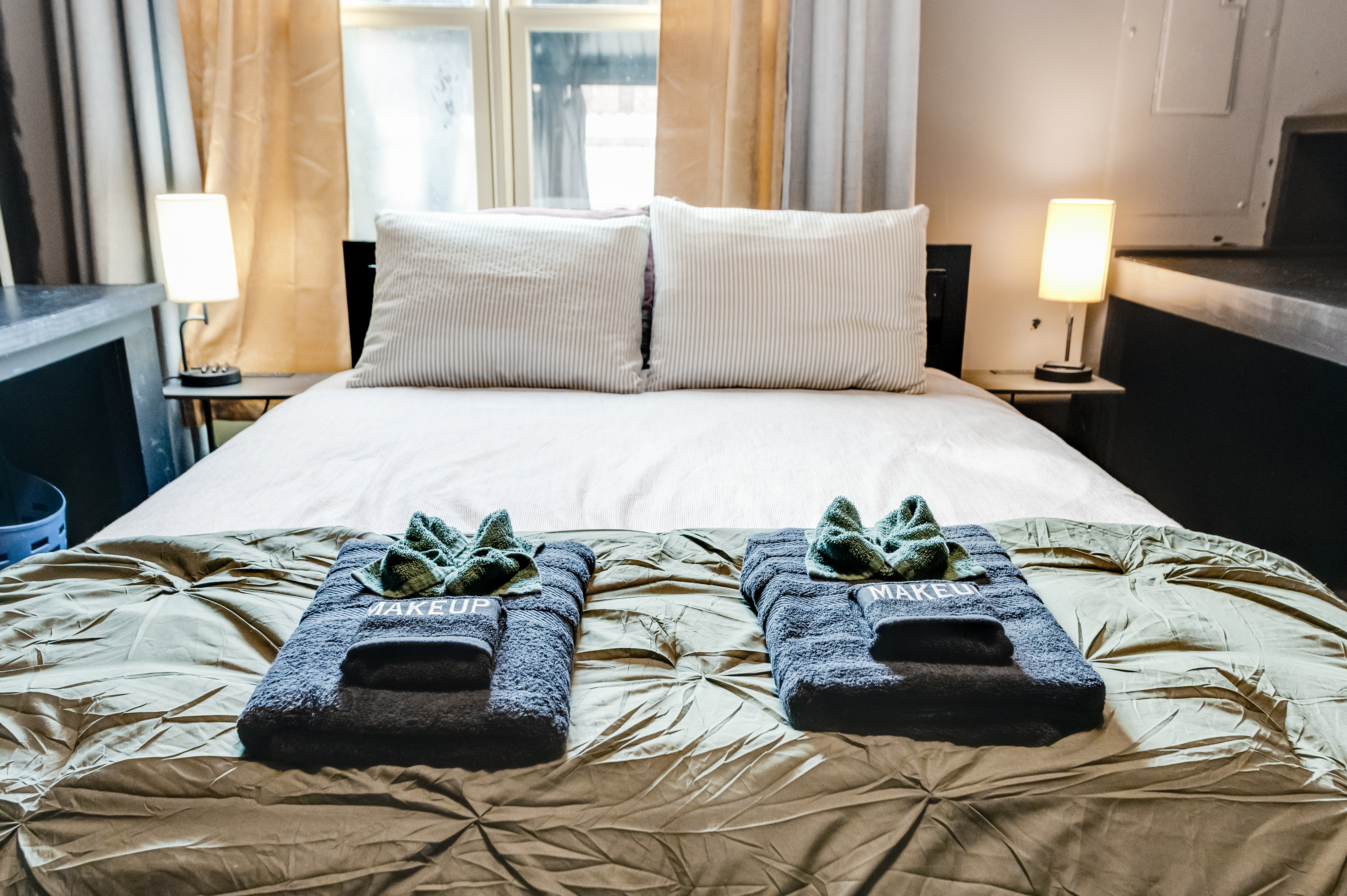 Queen Bedroom 1: Relax in this stylishly appointed room with soft lighting and plush towels!