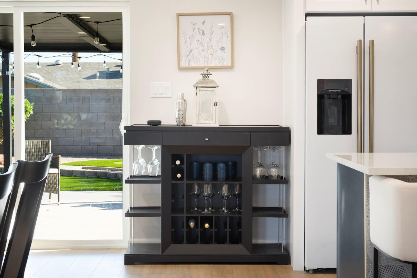 Stylish dining area with bar station and easy access to outdoor patio—perfect for entertaining and relaxing evenings