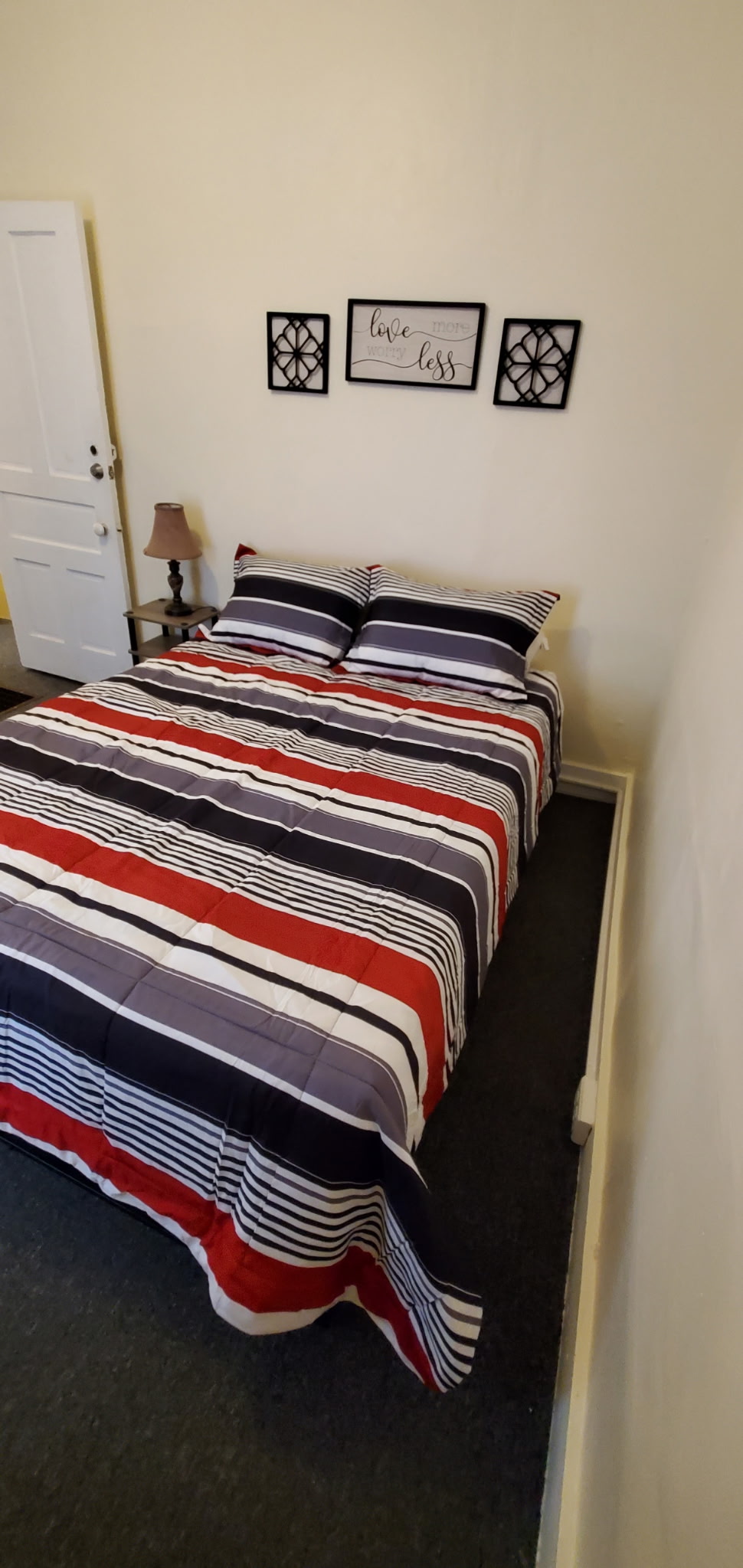 1 of 3 bedrooms all with Queen beds