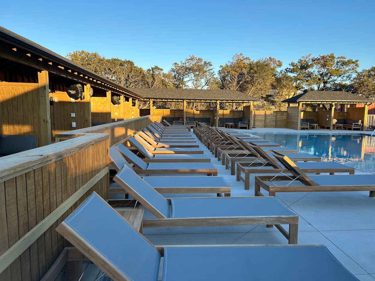 Resort-style pool with premium loungers