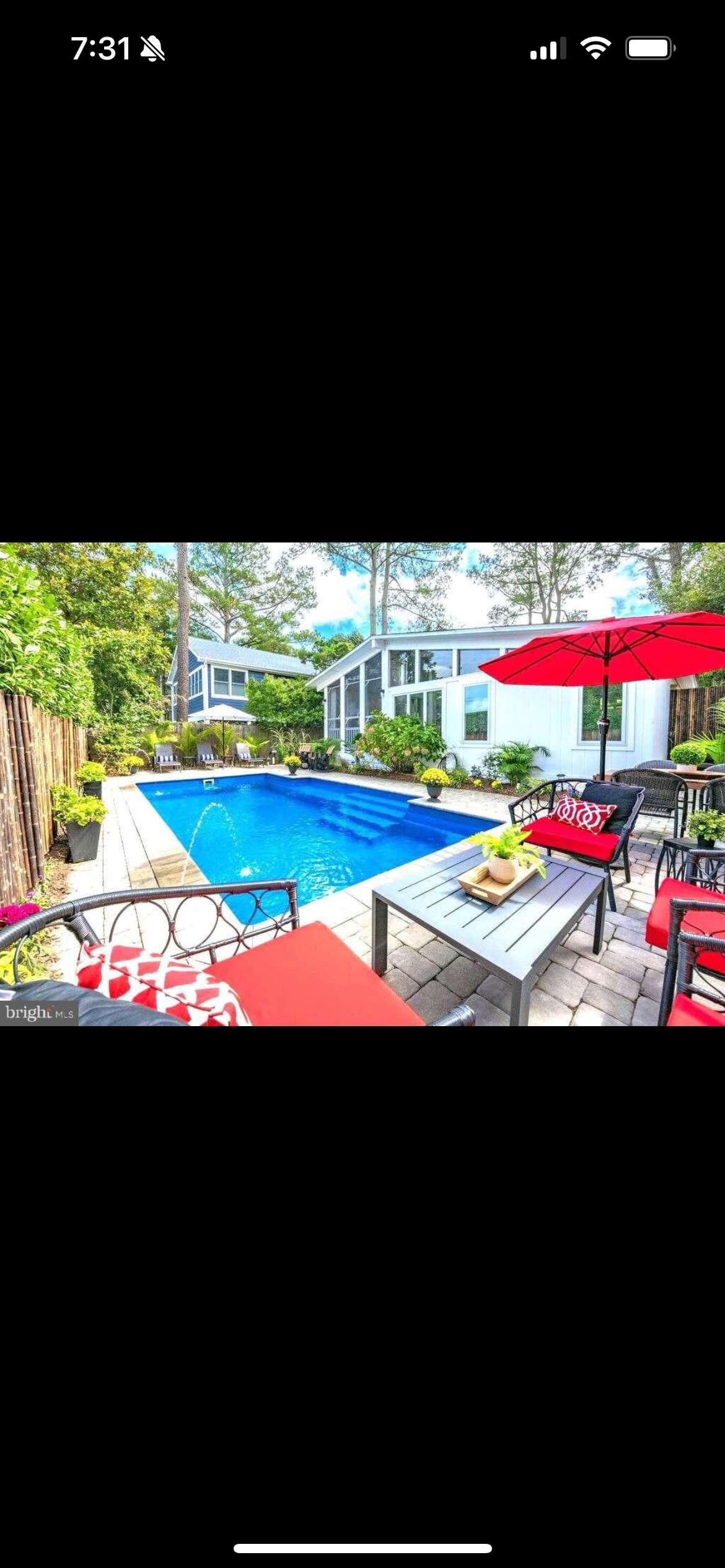 Enjoy this gorgeous salt water, heated pool in the privacy of your own yard.