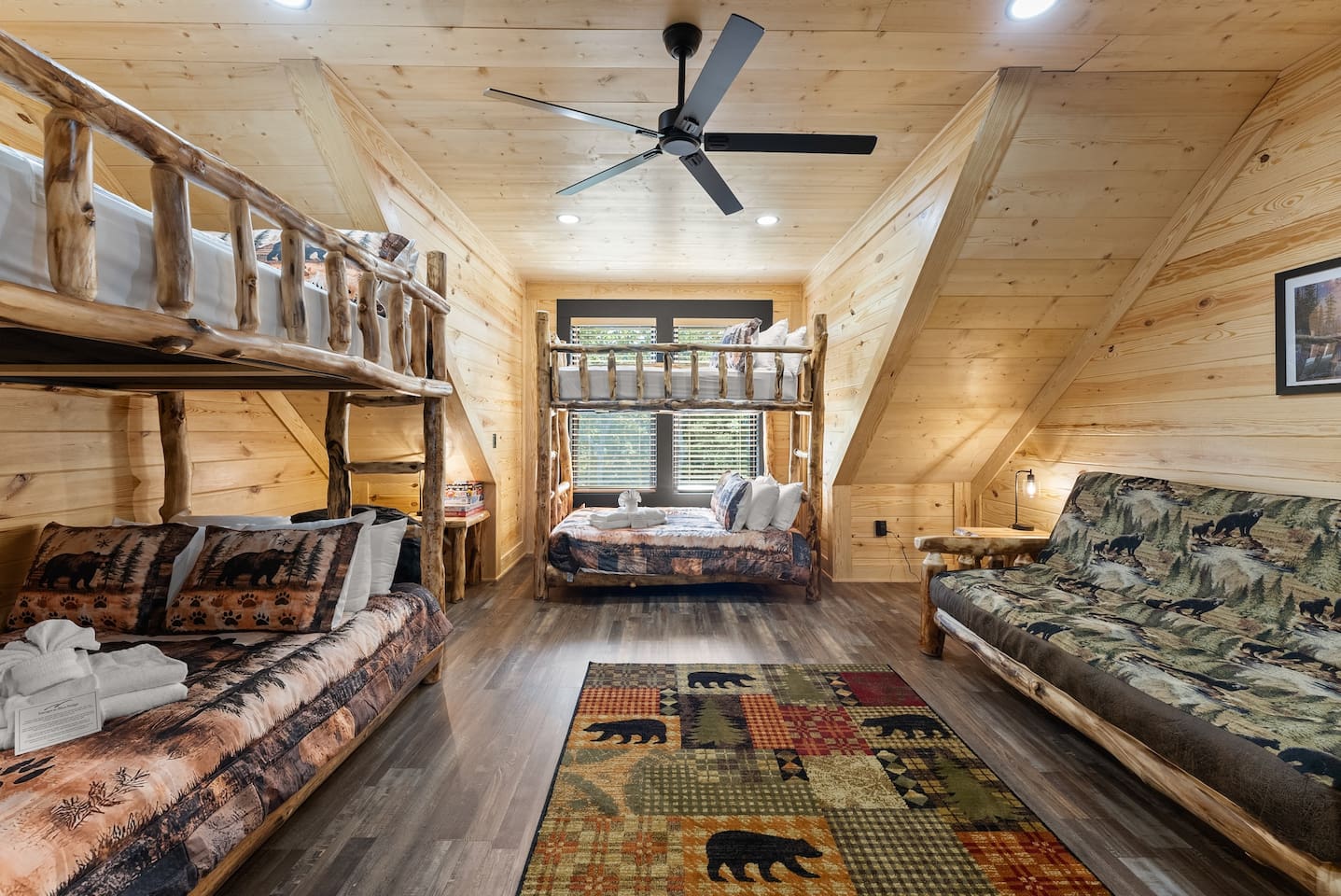 With cozy lodge-themed bedding, a reading nook, and charming rustic details, this room delivers both fun and functionality.