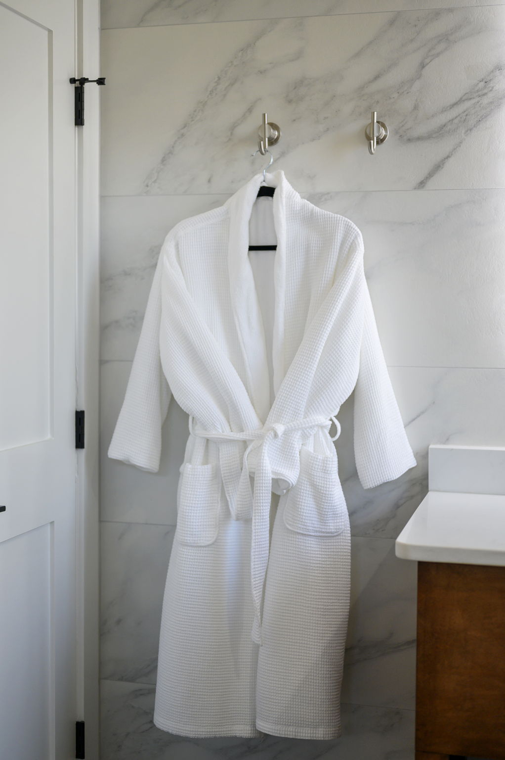 Luxurious robes and slippers are provided in each king suite.