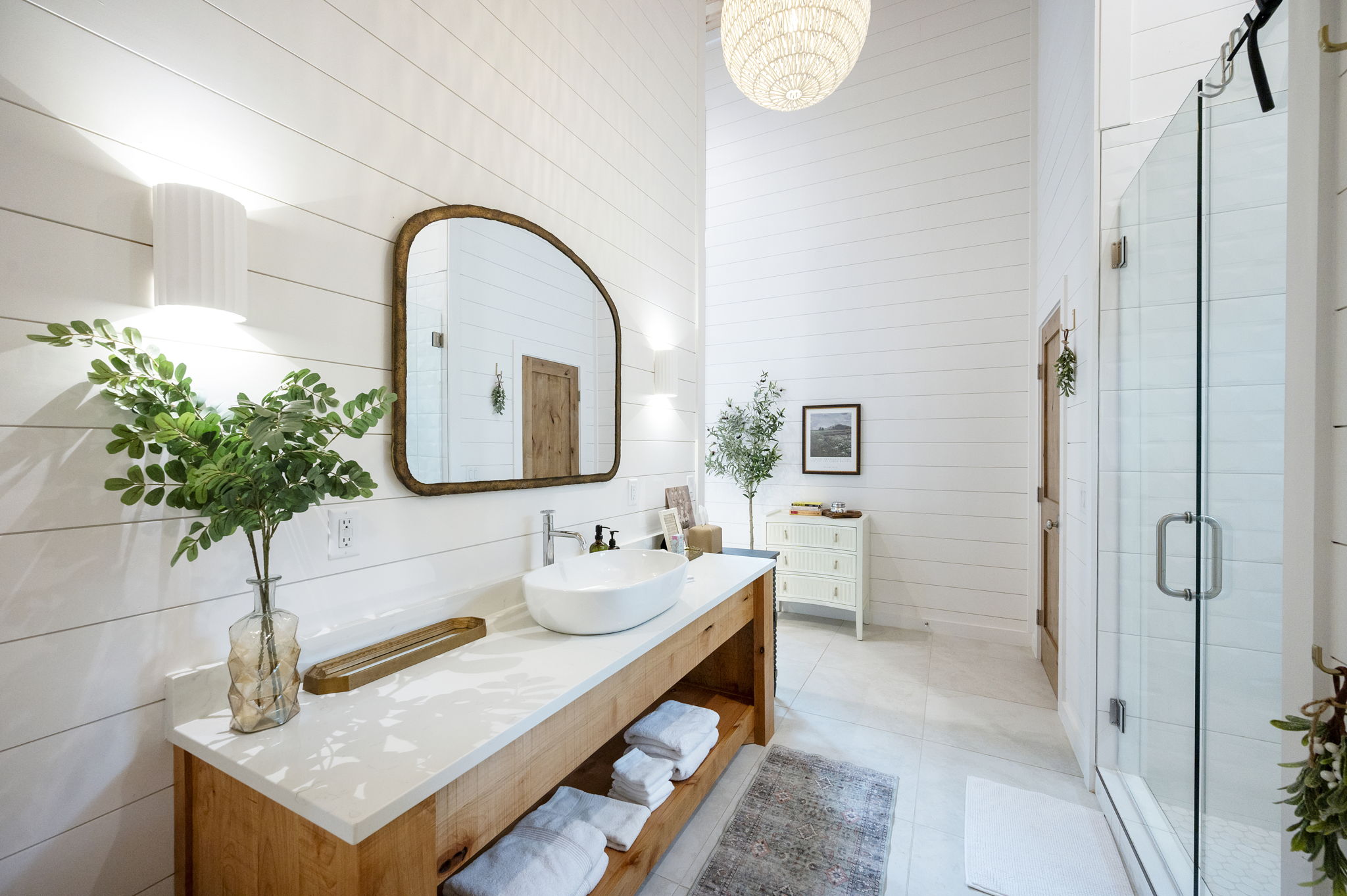 The private casita ensuite bathroom offers a luxurious, spa-like experience with premium finishes, warm design touches, and complete privacy—creating the perfect place to relax and recharge.
