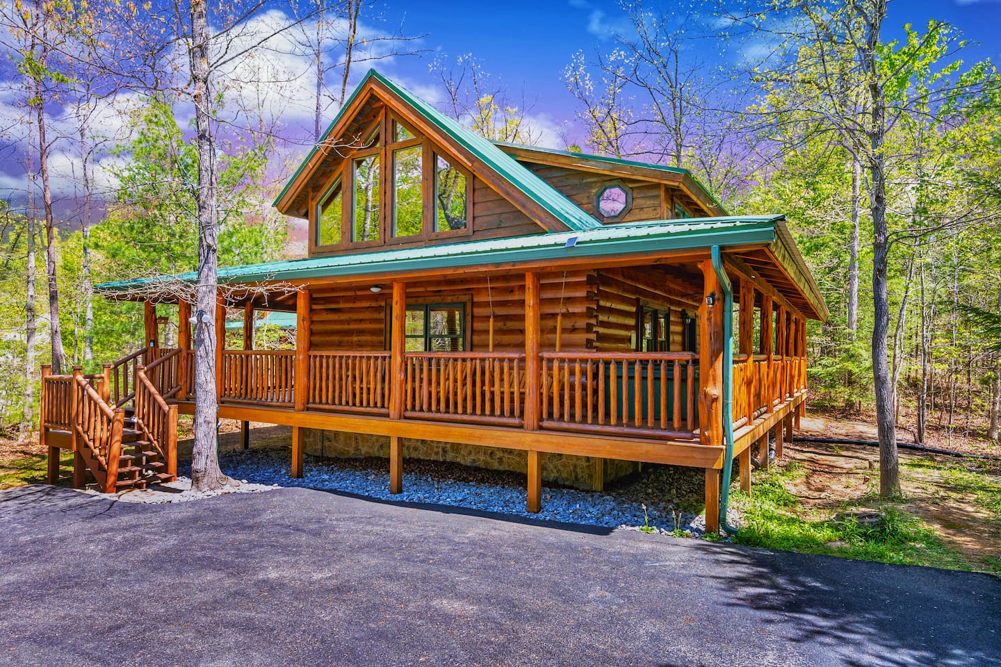 Wrap-around porch cabin with plenty of parking
