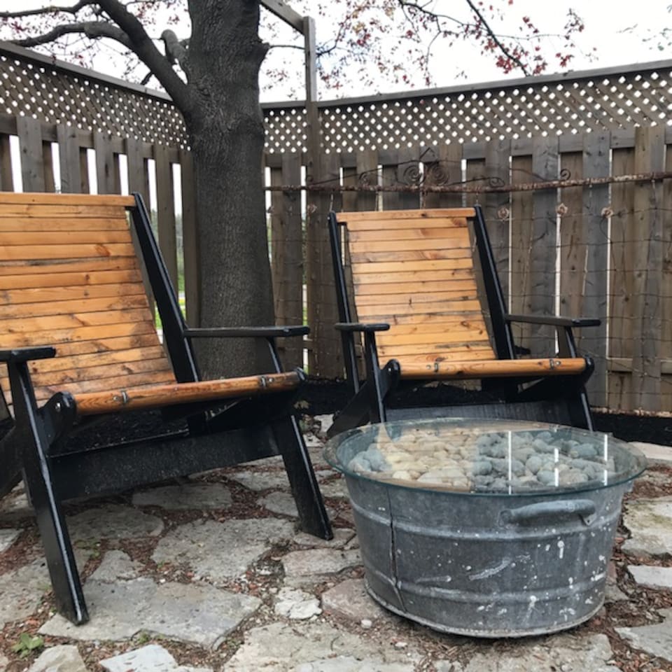 Sit in the backyard under a shaded tree and relax. 