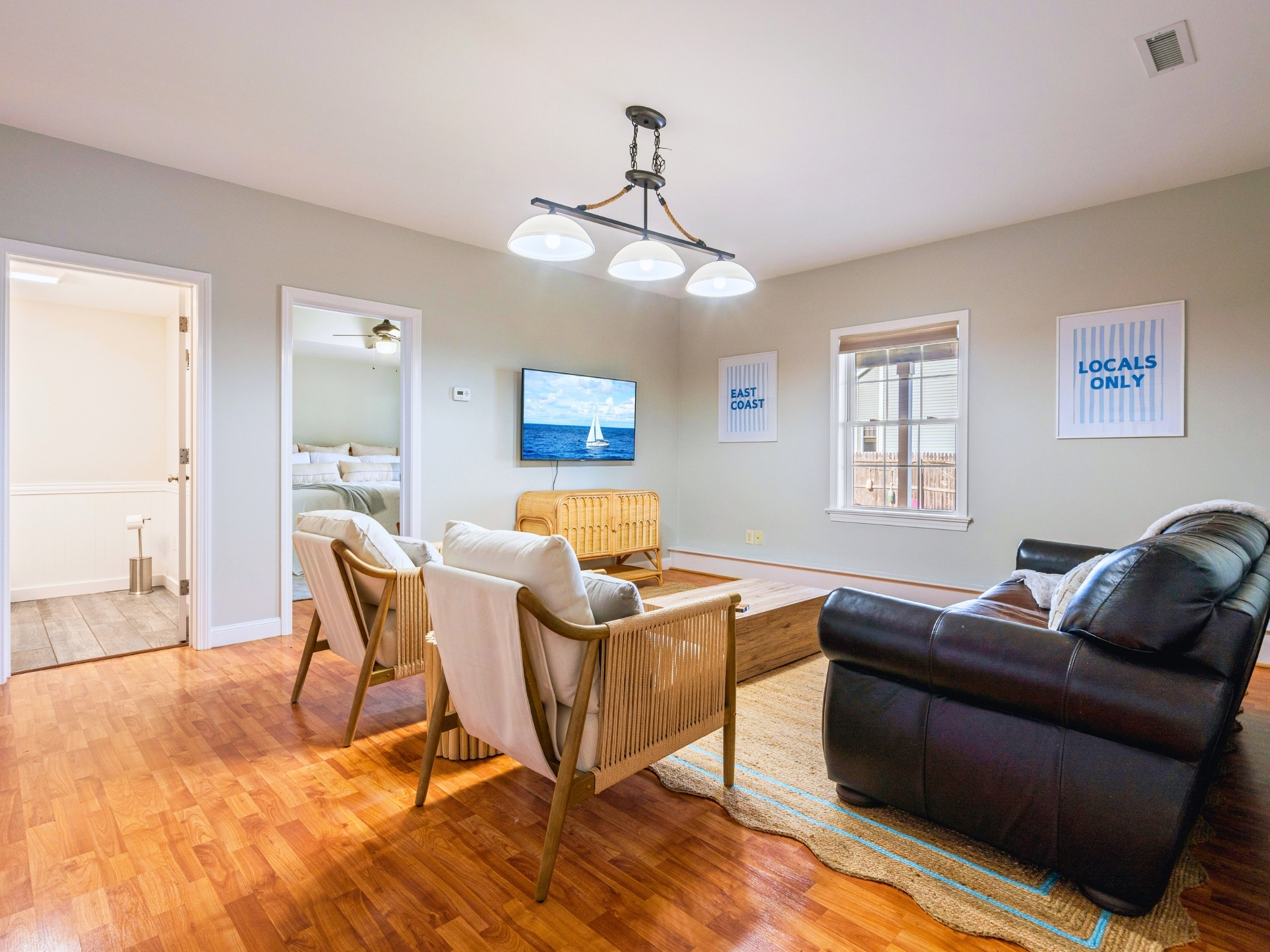 Our basement living room is your home away from home, a space to relax, laugh, and make memories with family and friends.