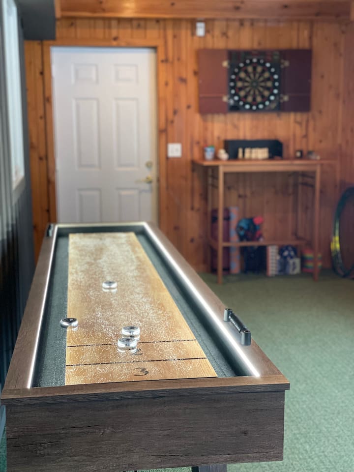 Shuffleboard game area perfect for friendly competition.
