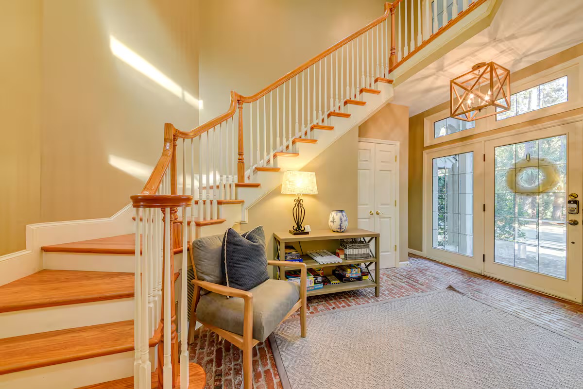 Main foyer and stairway entering Twin Pines