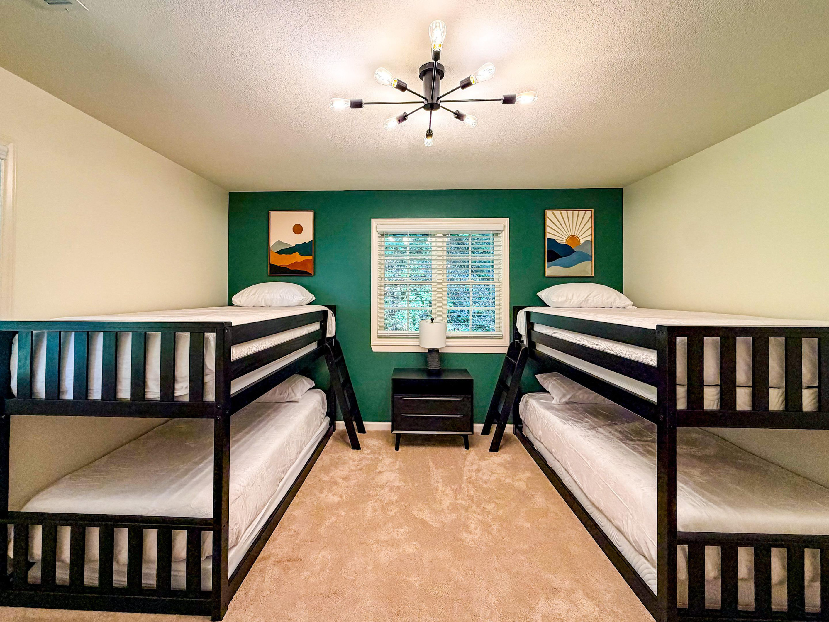 The bunk room is on the upper level complete with 4 twin bunks. Please note that top bunks will have linens provided but will not be made.