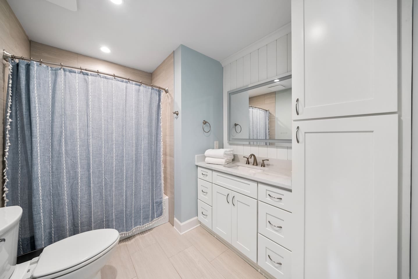 Guest room of Unit A with a queen bed. 