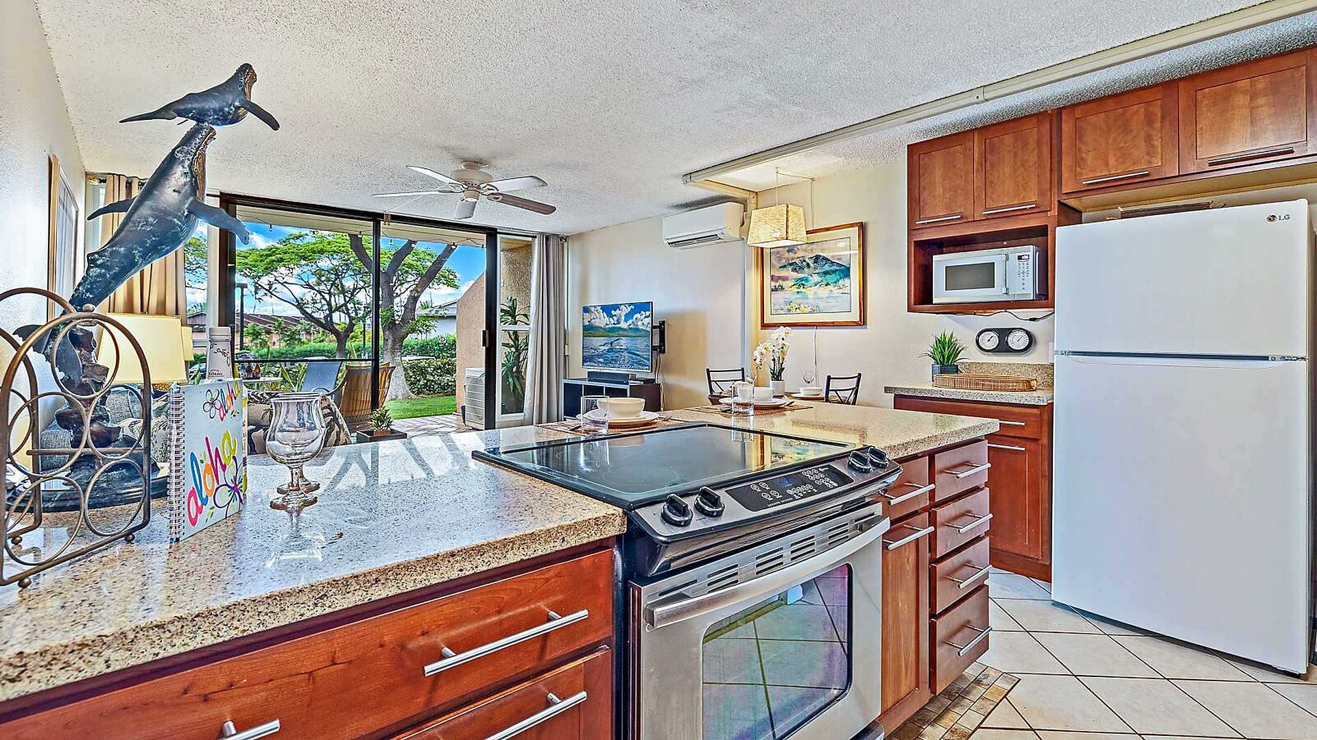 Open concept kitchen with quartz countertops.