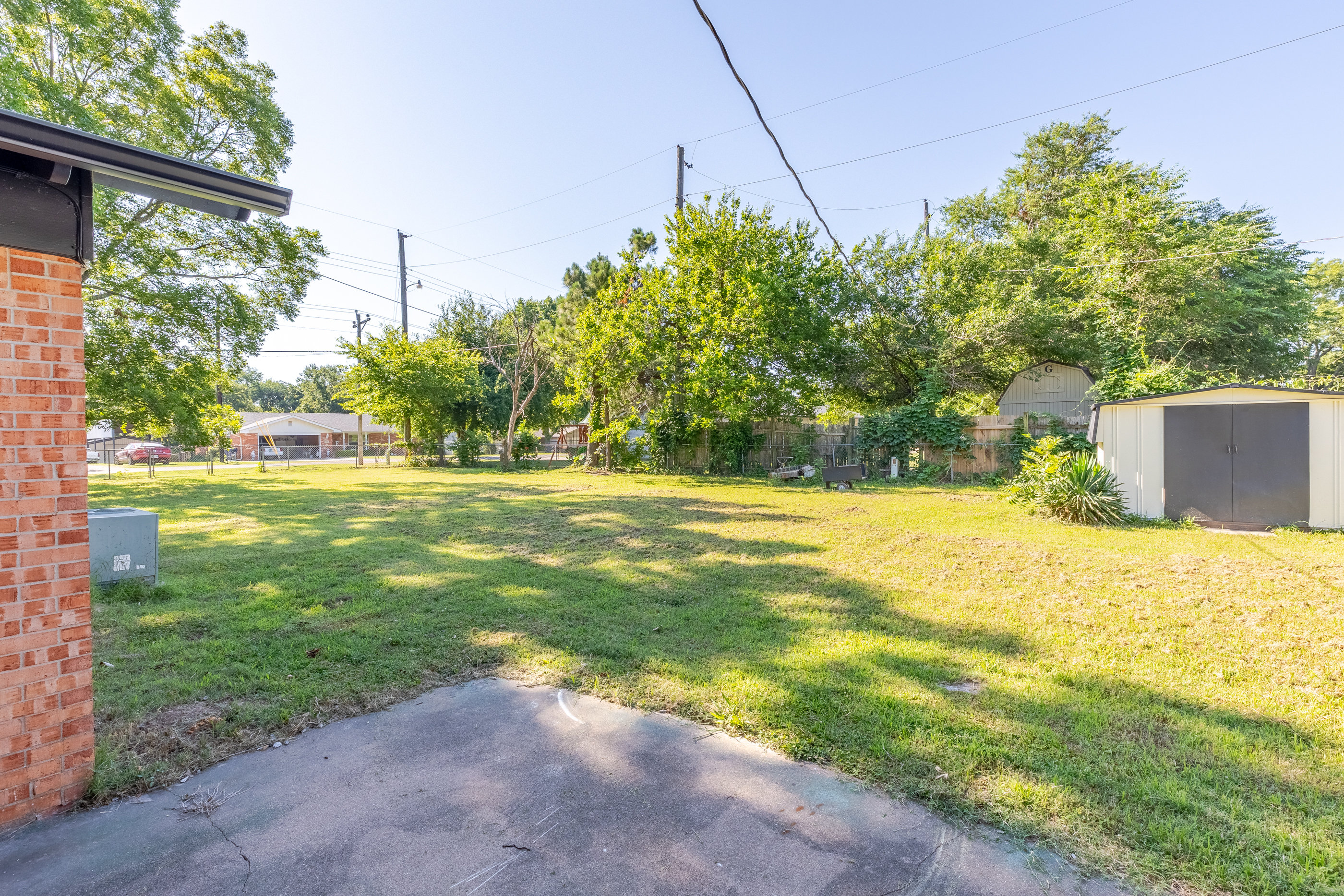 Spacious fenced yard for relaxation and play.