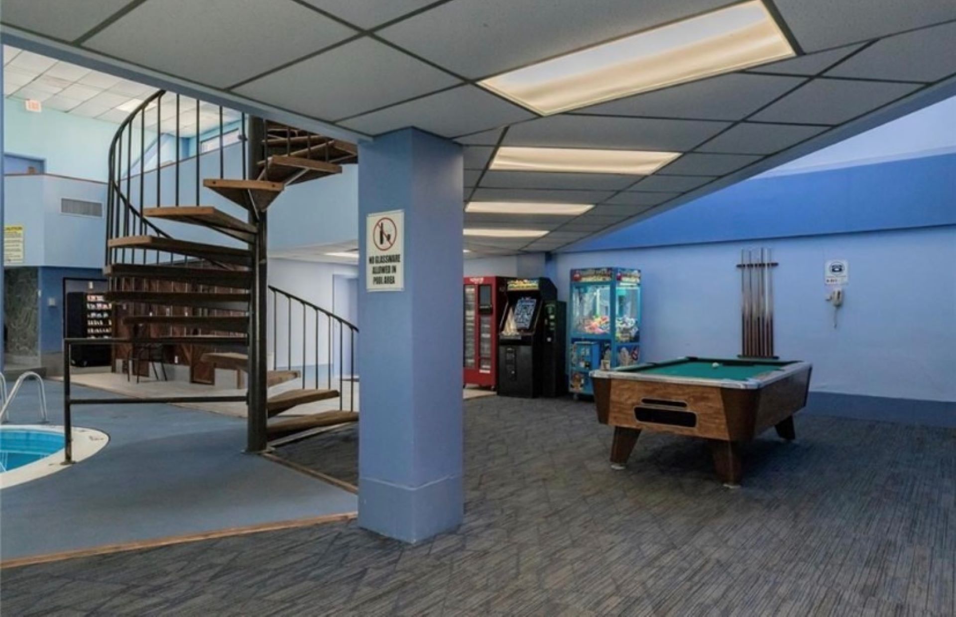 Game room with pool table, ping pong, and electronic games