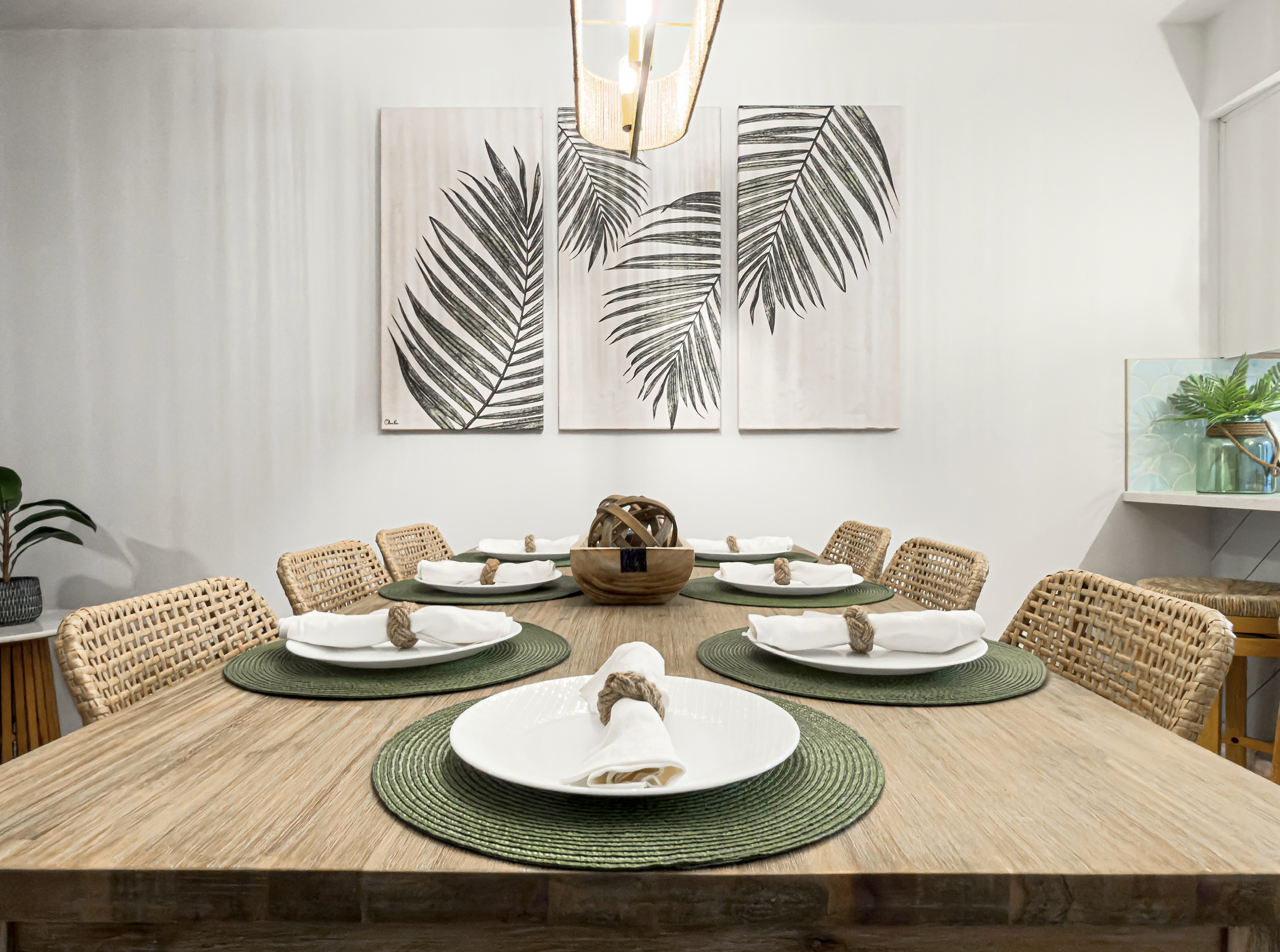 Share stories and local takeout around this sturdy dining table. There is plenty of elbow room for everyone to dine comfortably. Relax here with a glass of wine before bed.