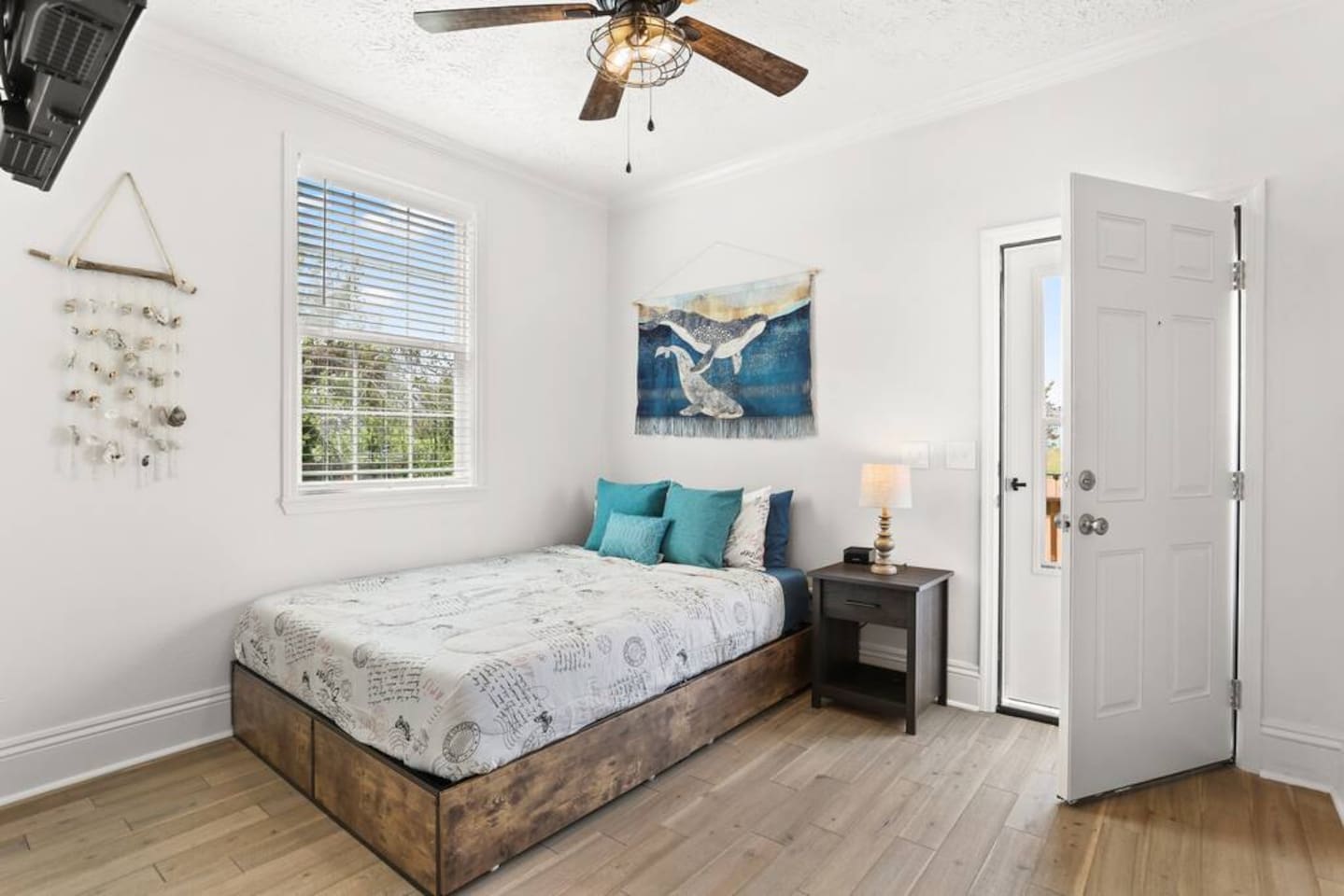 The "Whitewater" master bedroom with en suite bathroom also has direct access to the back porch, yard and pool! 