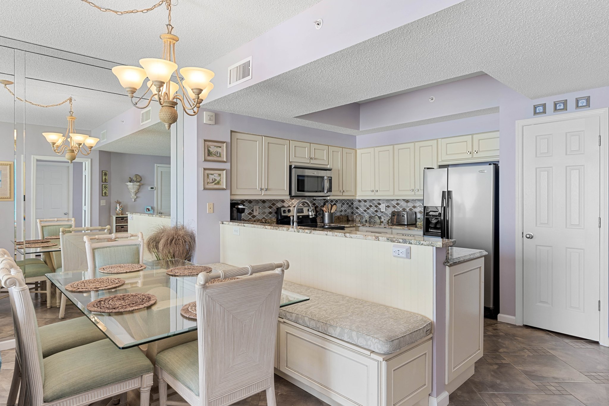 Kitchen bar seating offers a casual spot for coffee, snacks & conversation.