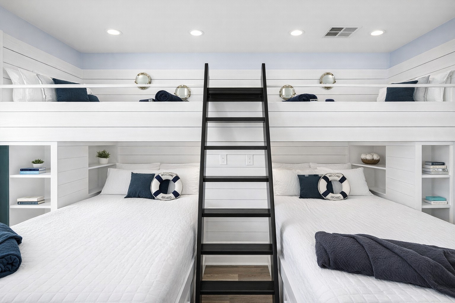 Bunk Room (Upper Level): Dual bunks and built-in shelving make this a fun group sleeping space.