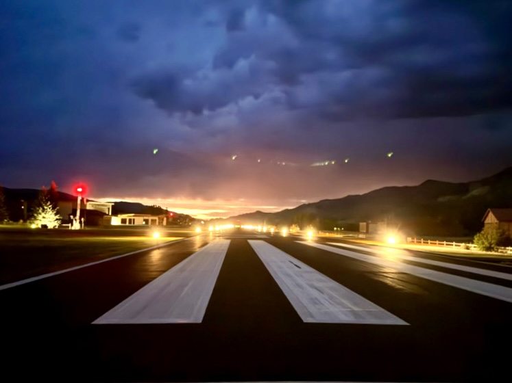 Every pilot chases a view like this one - final approach, hovering above the numbers, the Teton Mountain Range in the distance, and Alpine Airspace vacation rental just steps away.