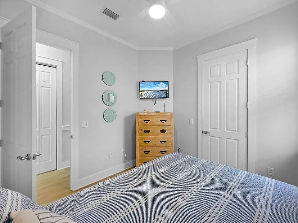 Queen bedroom with a TV