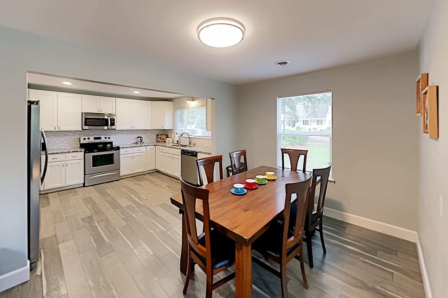 Kitchen & Dining: Bright space with modern appliances and a charming dining table for family meals!