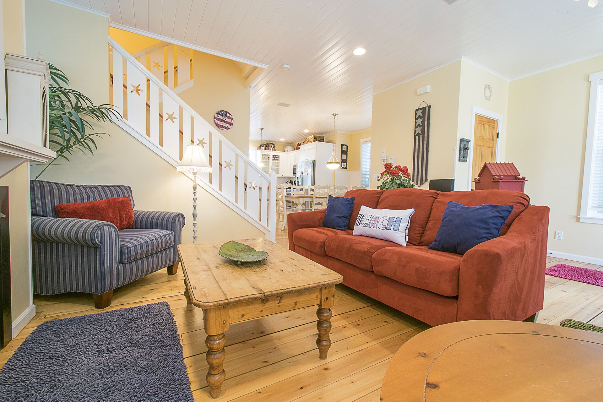 Experience classic beach cottage style — wood floors, white-painted wainscoting, and décor that complements the coastal vibe.