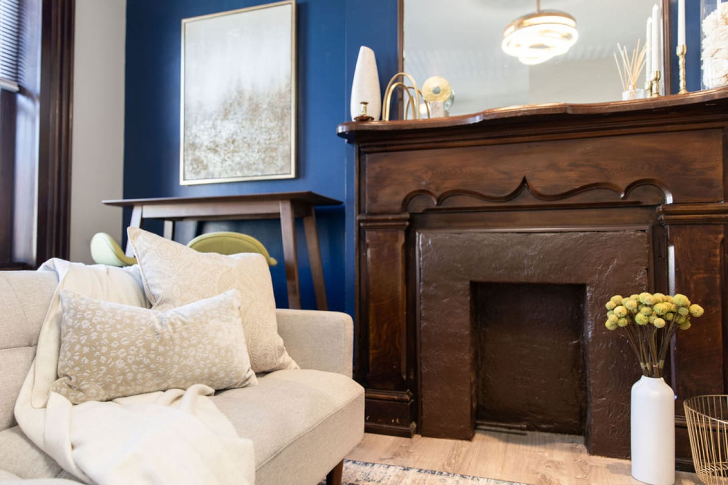 Comfortable couch adorned with soft pillows, providing a cozy spot to relax and unwind after a day of exploring.