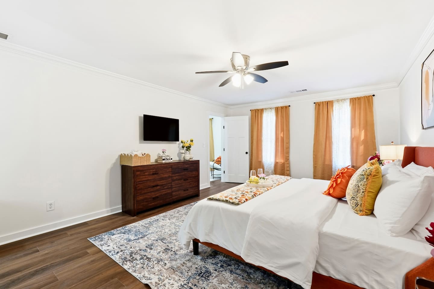 Beautiful second-level master bedroom featuring a king bed, a Roku-powered Smart TV, and located all the way to the right at the top of the staircase. This room includes 2 full-body towels, 2 washcloths, and 2 hand towels for your stay.