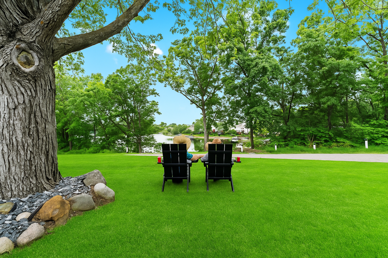 Enjoy lake views and fresh air from your front yard—perfect for morning coffee or sunset chats under the trees.
