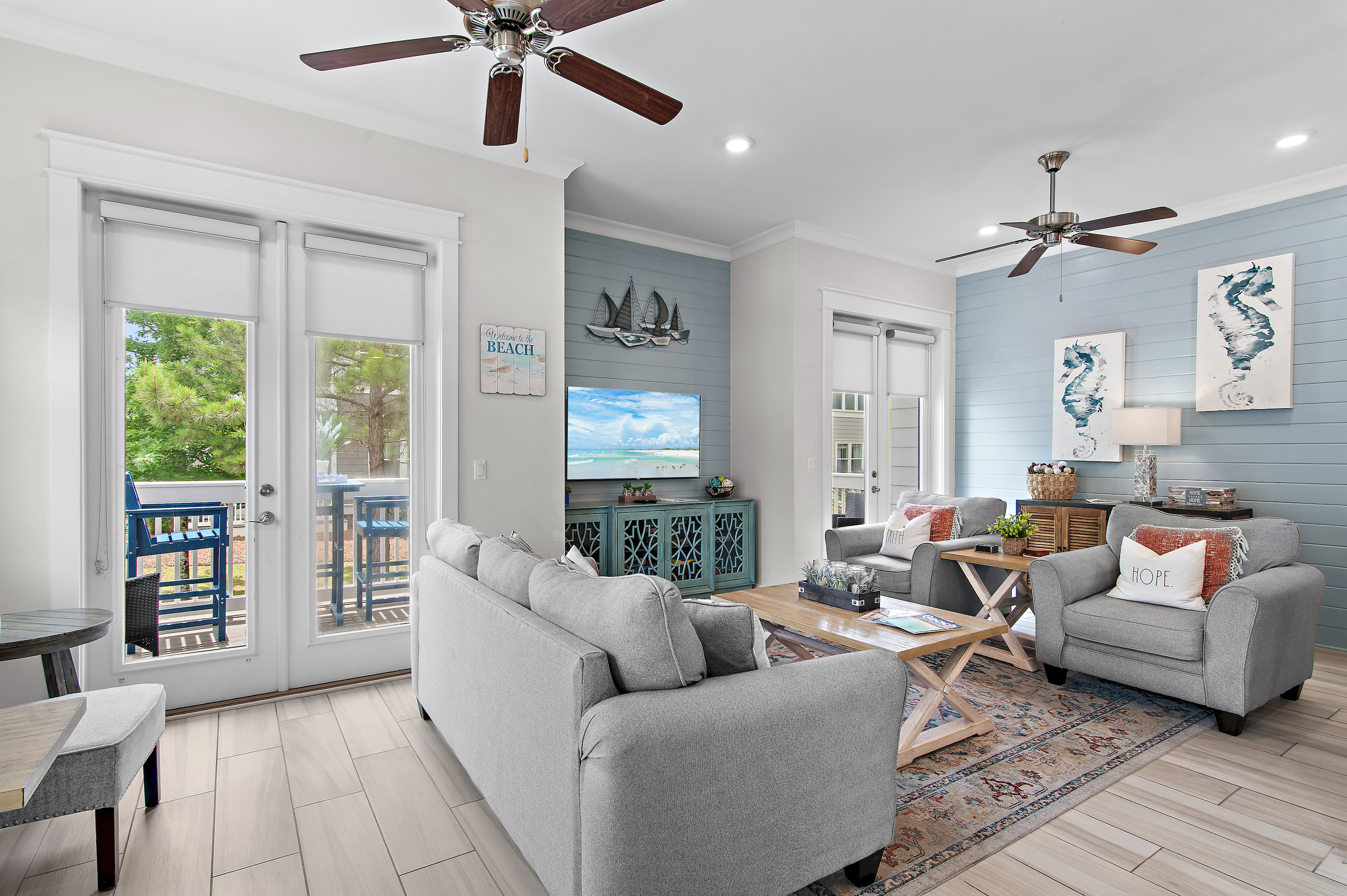 Rest up for a day on the beach in the living room with multiple doors to the wrap around patio