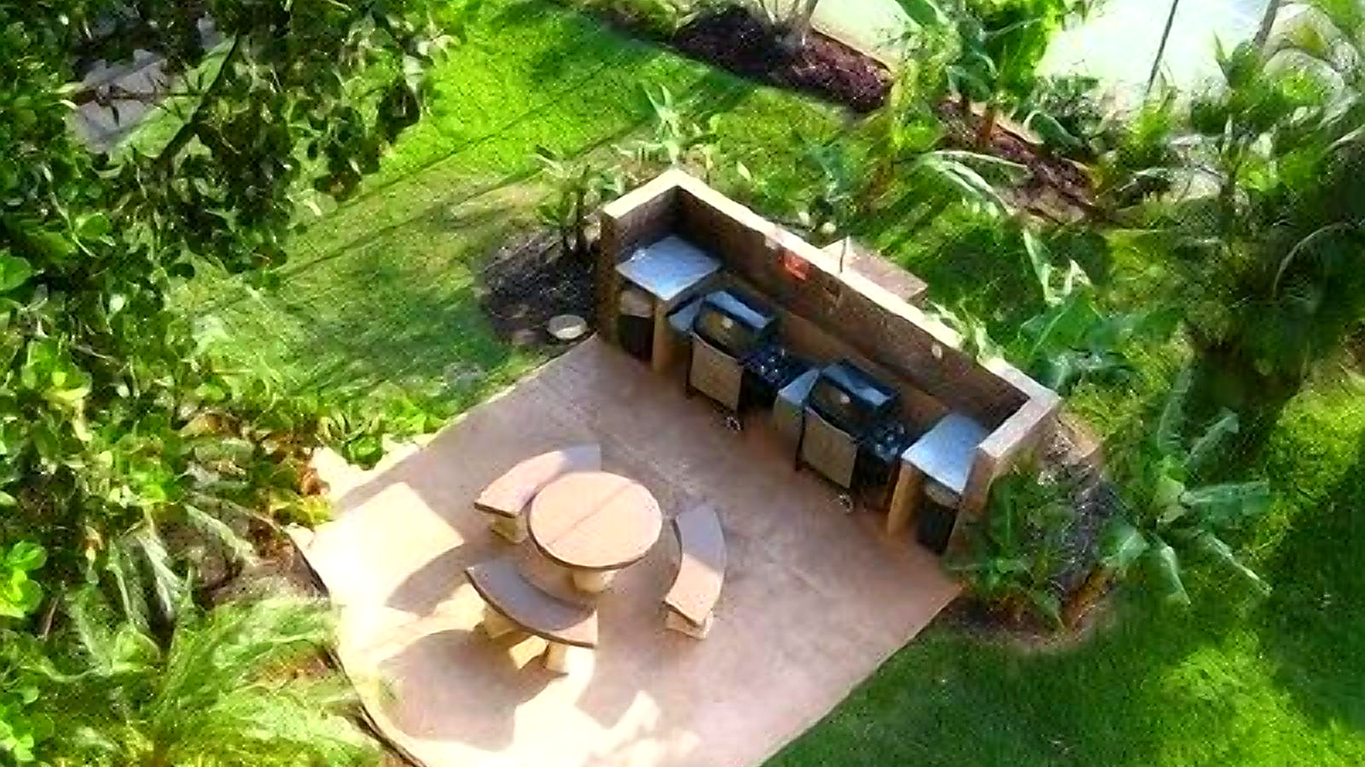 Well maintained gas BBQ grill area right outside the door.