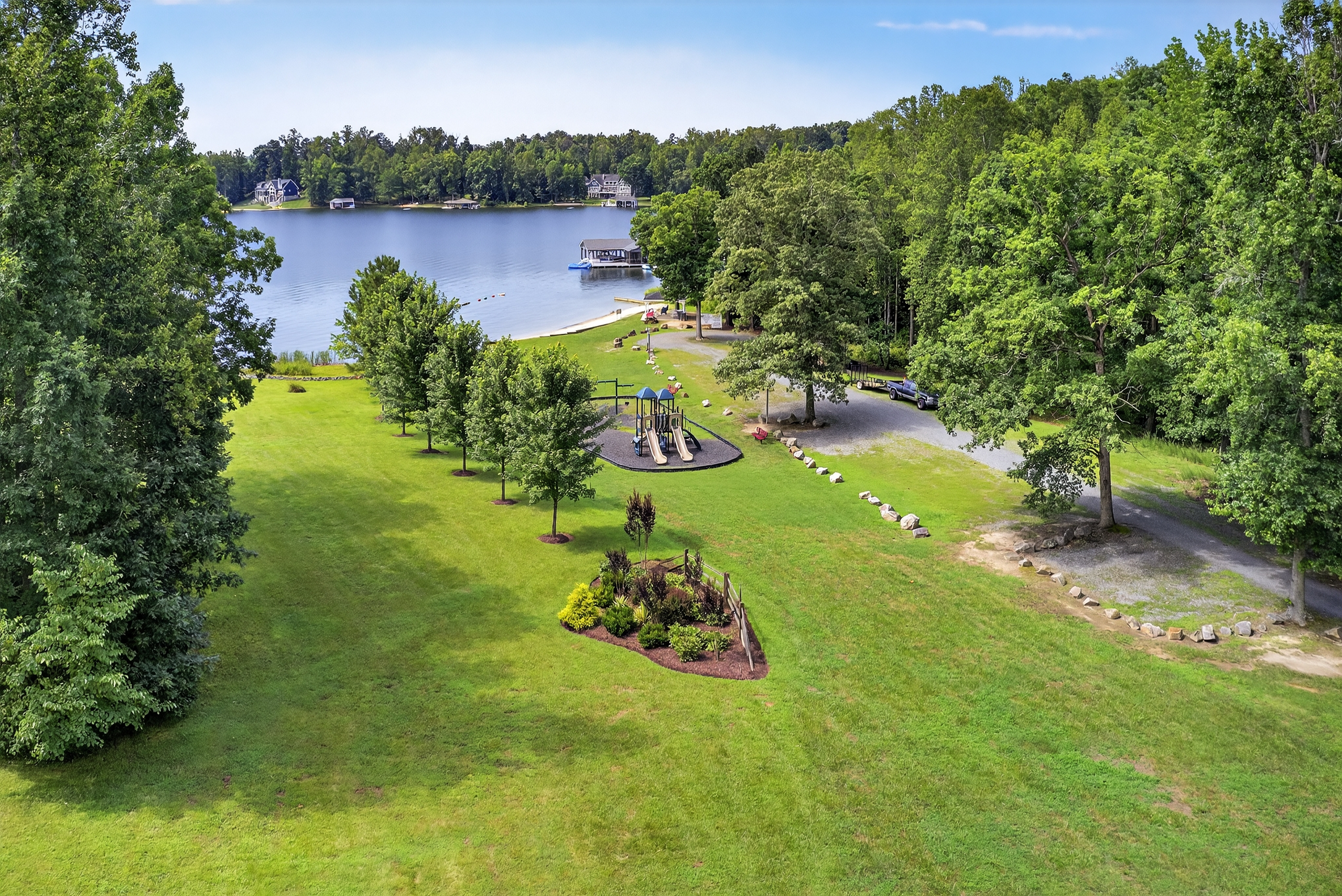 The nearby playground makes this area perfect for families looking to relax and play by the lake.