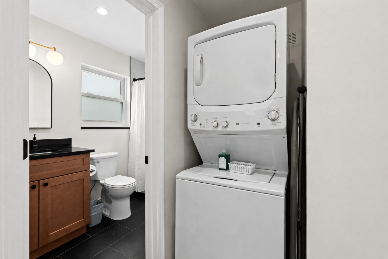 Convenient in-unit laundry tucked beside the bathroom—making everyday chores easy, efficient, and stress-free during your stay.