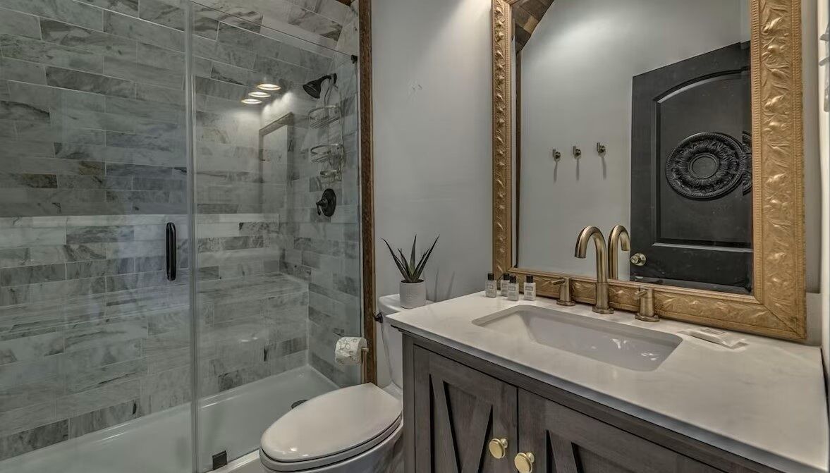 Spa-style bathroom in the detached guest suite above the garage with walk-in shower and elegant finishes for a relaxing, self-contained retreat.