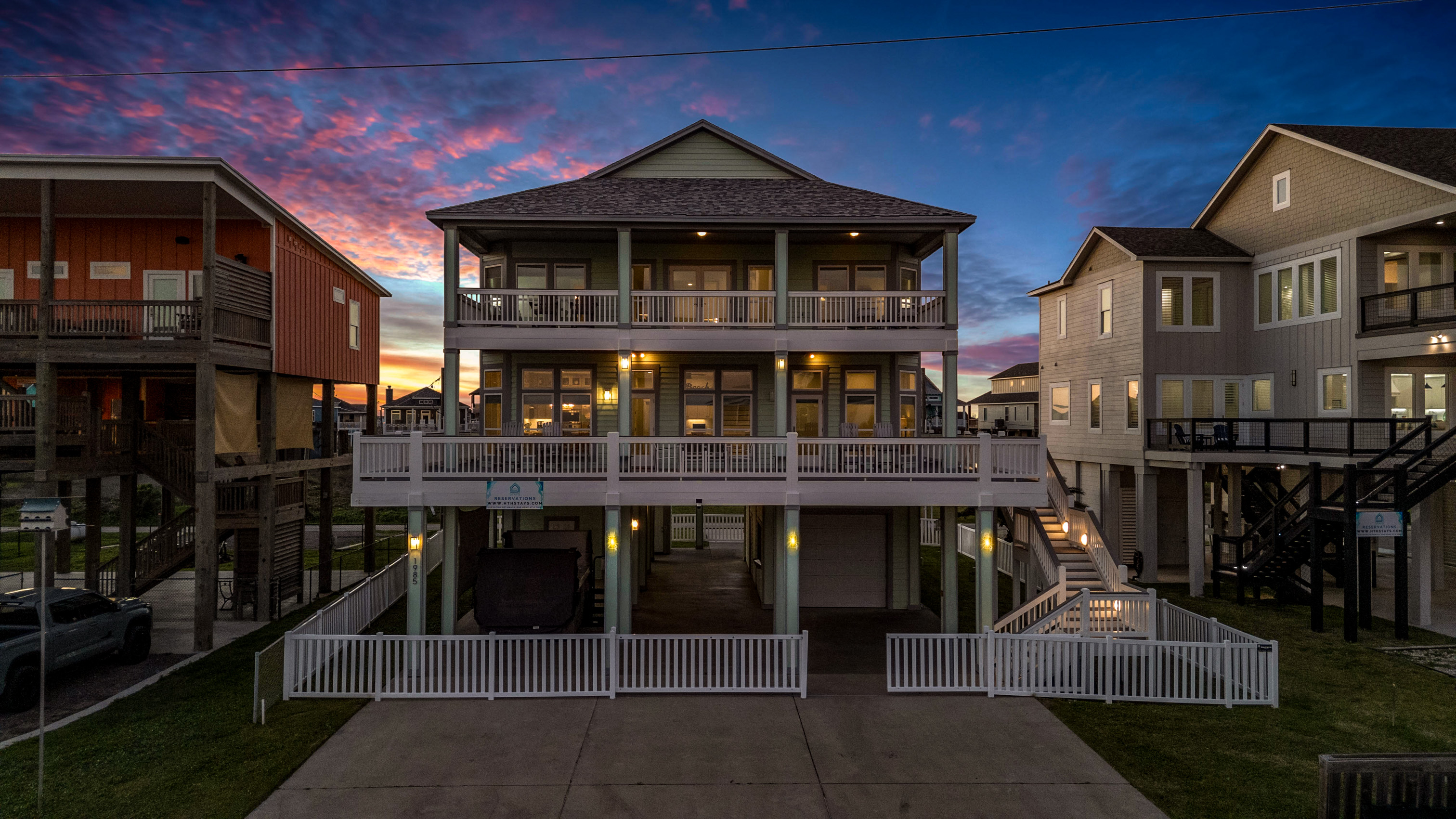 Crystal Paradise Exterior: Unwind under the evening sky from the private balconies while listening to the calming ocean breeze.