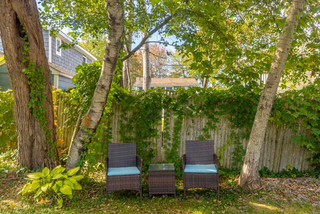 Outdoor space equipped with picnic tables for your comfort.