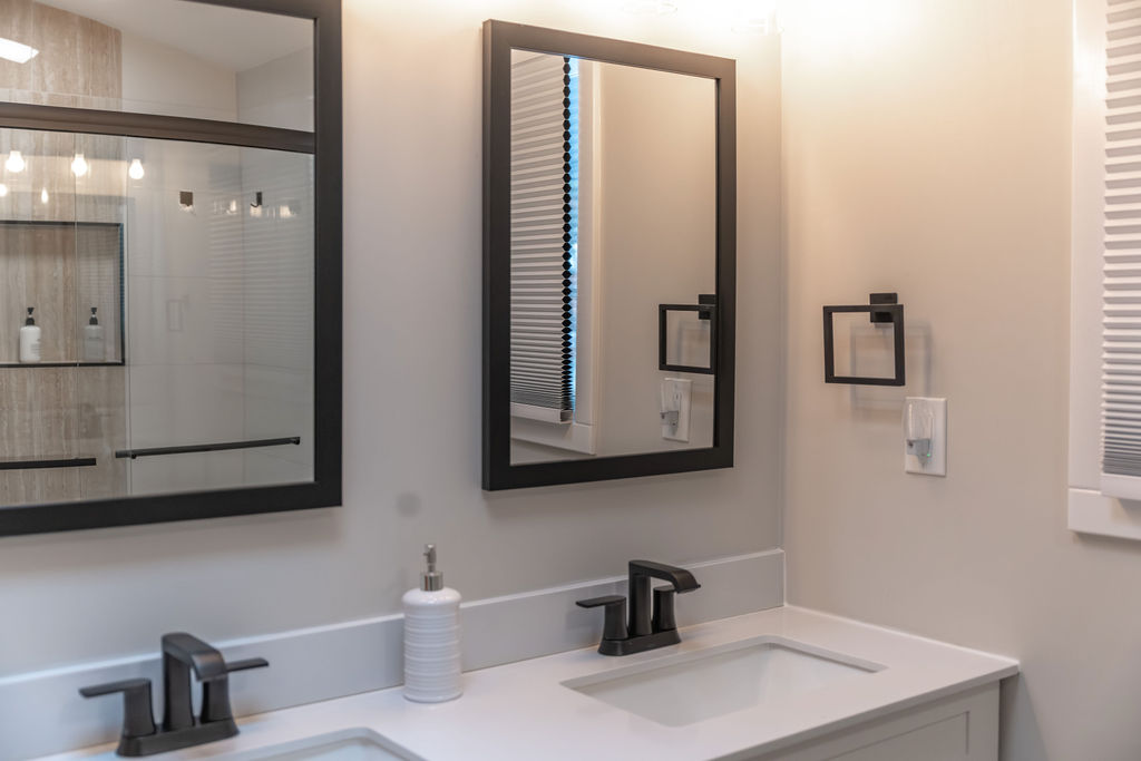 Ensuite full bathroom of Master Bedroom with dual vanities and a glass door shower!