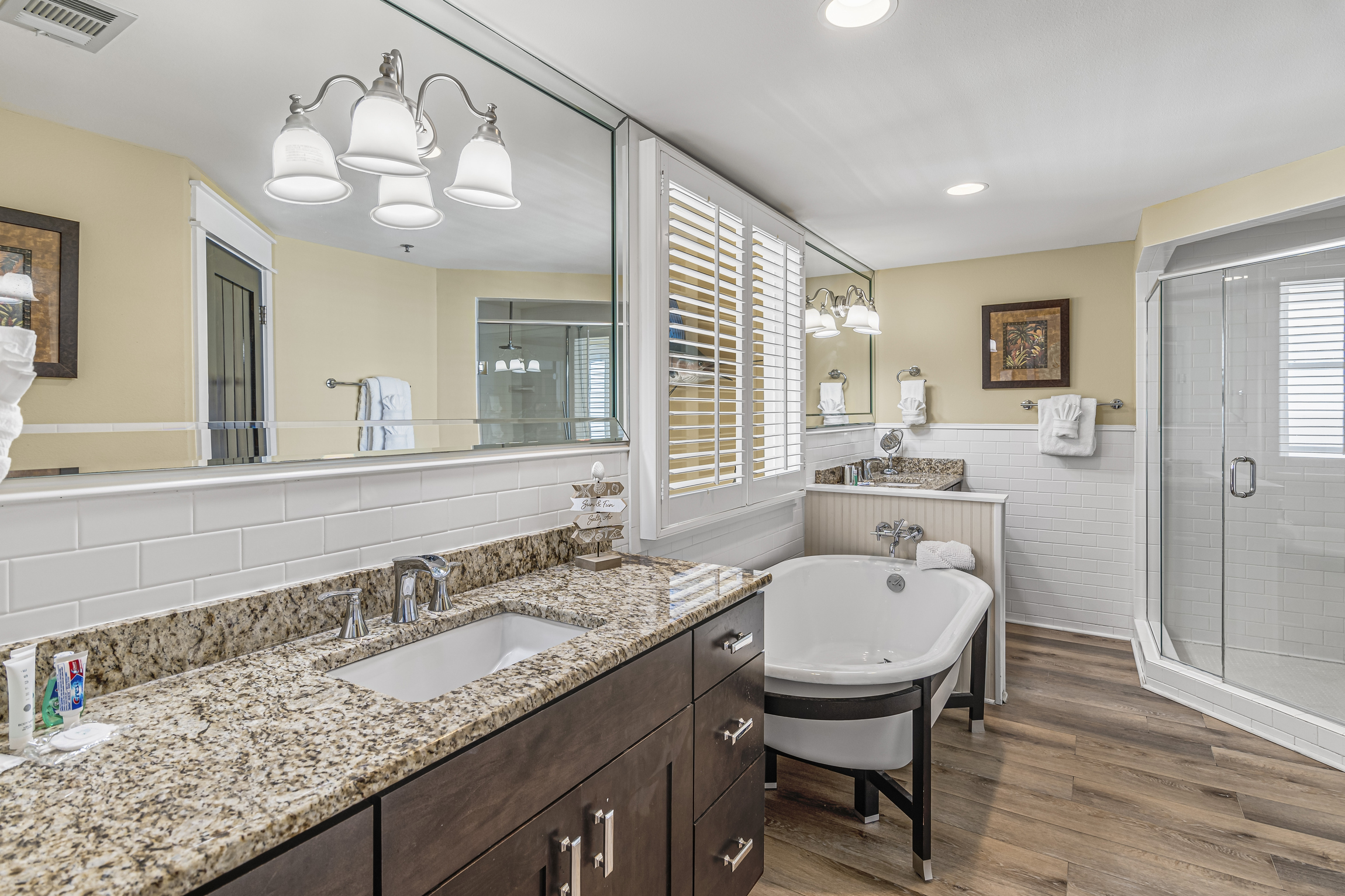 Private Remodeled Master Bathroom with dual vanity and walk in shower, soaker tub, and Gulf views!