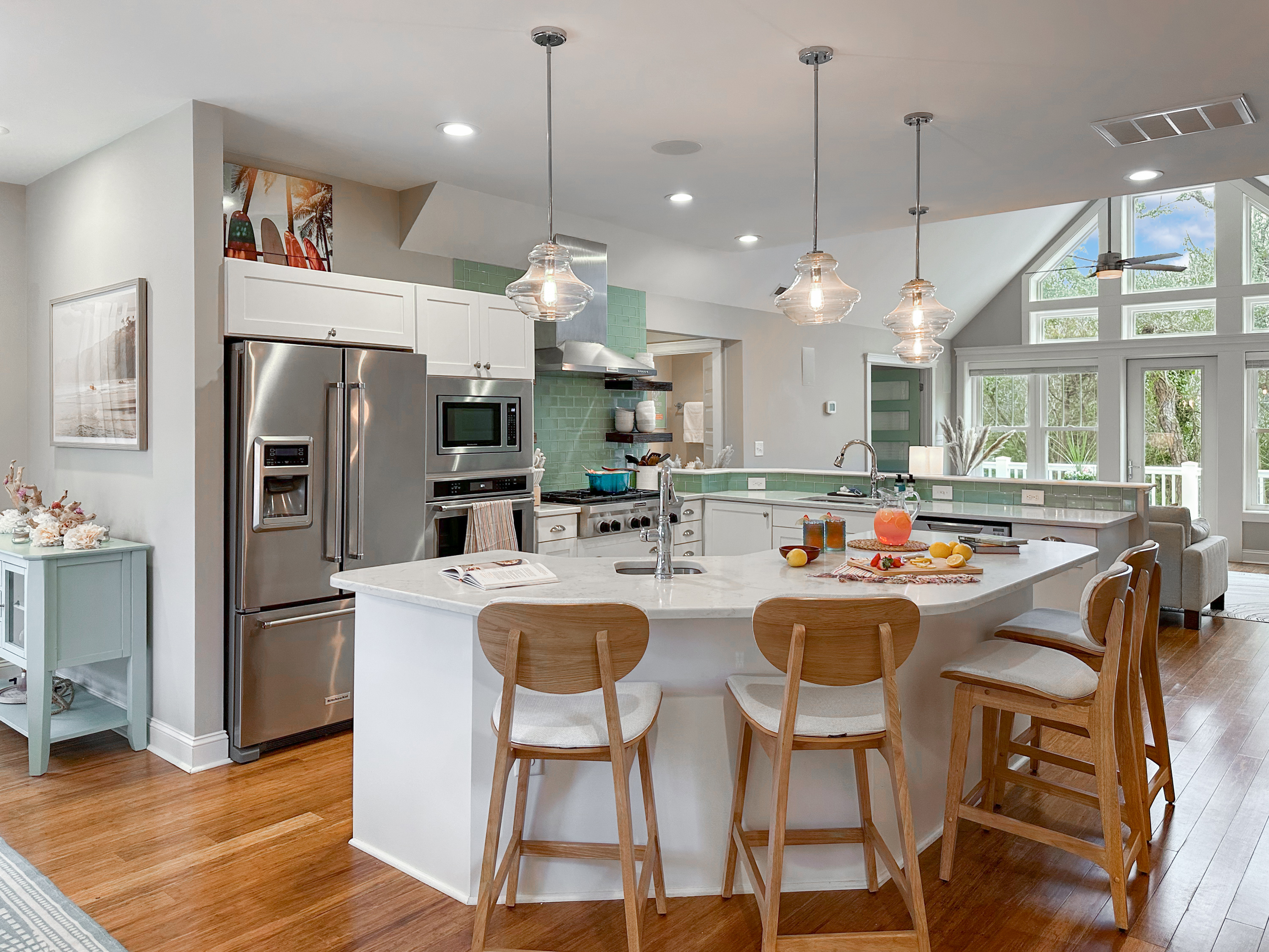 The fully stocked Kitchen comes with stainless steel appliances and an island with extra seating...