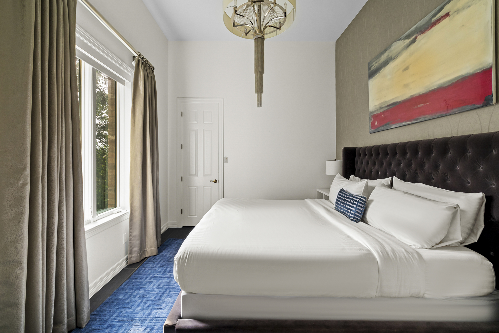 Bedroom 2 - King bed on the ground level, off the game room.